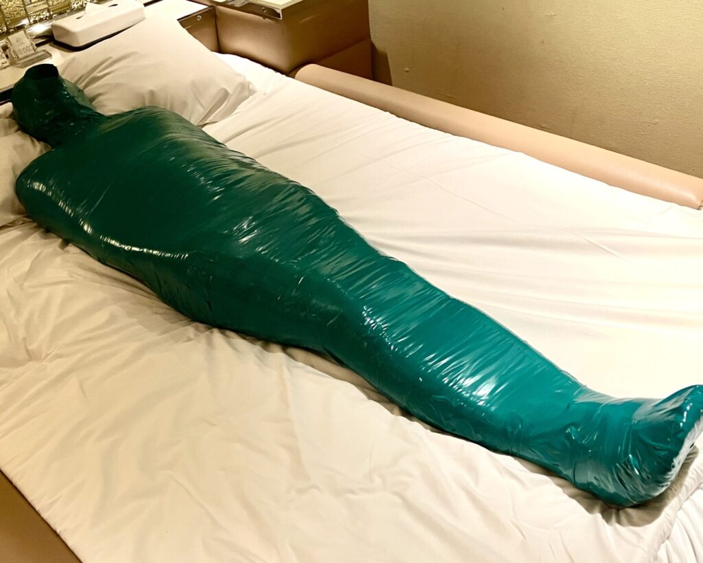 Full-body mummification with green tape and wrap, Tokyo BDSM session by Mistress Rio