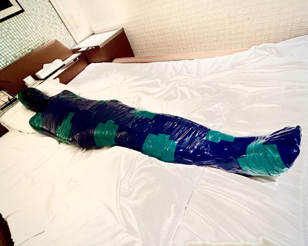 Blue and green tape mummification, Tokyo femdom session gallery